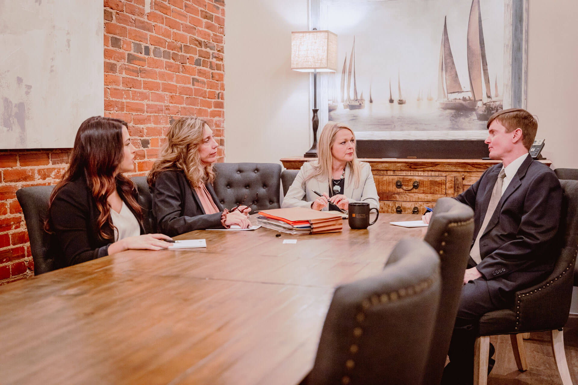 attorneys talking at a table